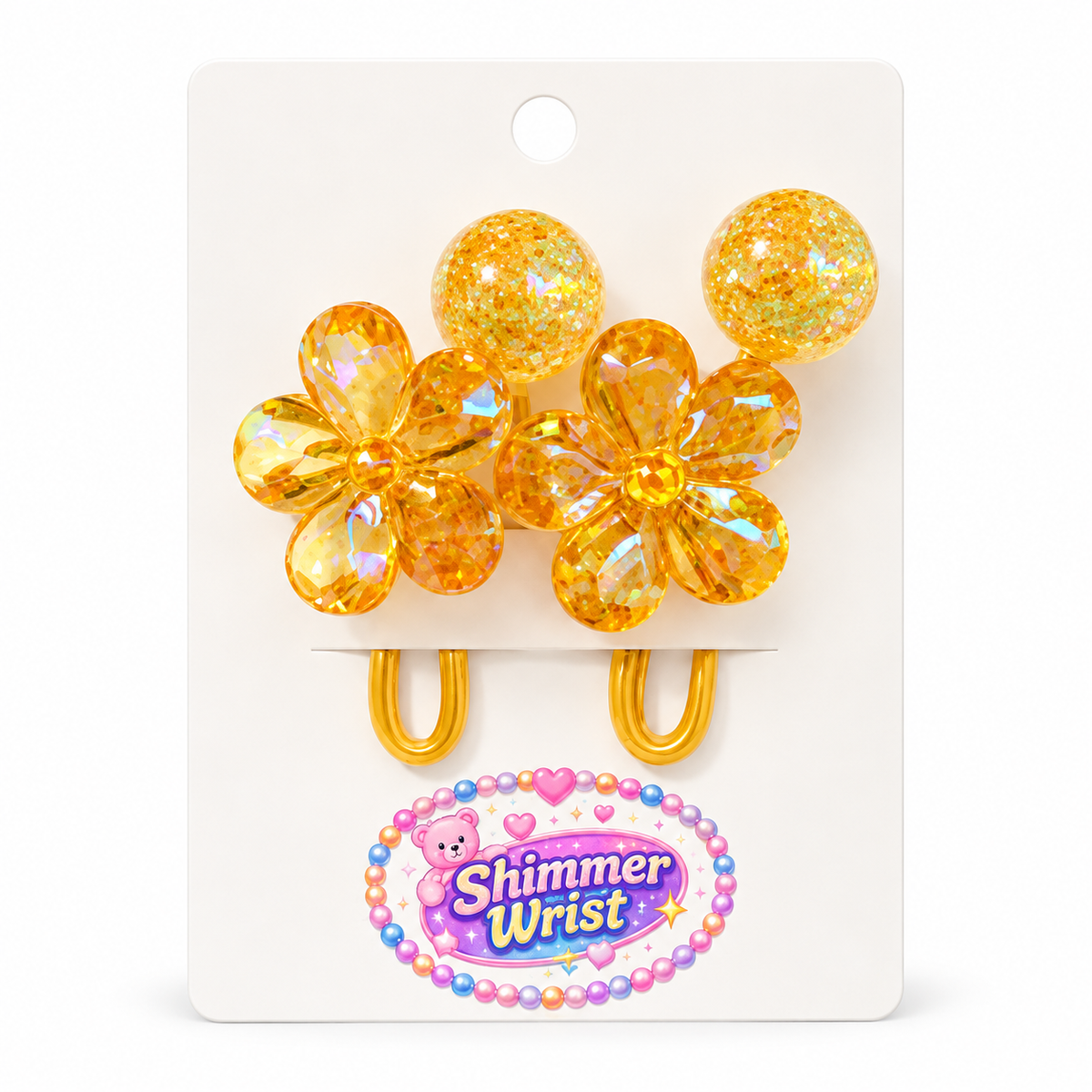 Crystal Bloom Golden Amber flower hair ties, two on a display card against white