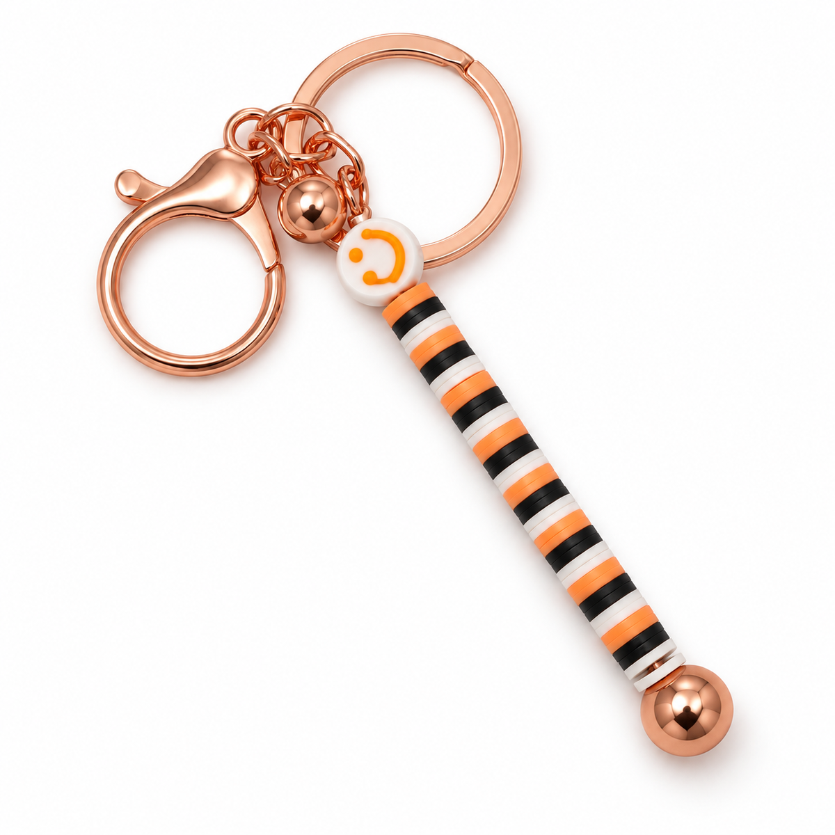 orange smile keychain on a white background