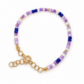 purple beaded bracelet on a white background